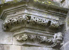 Base of a door with a character with long whiskers